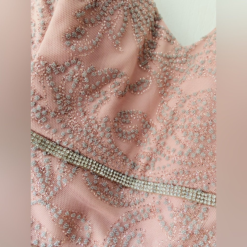 Stunning and super fun, hi-low, ruffle dress with rhinestone trim. - Picture 3 of 5